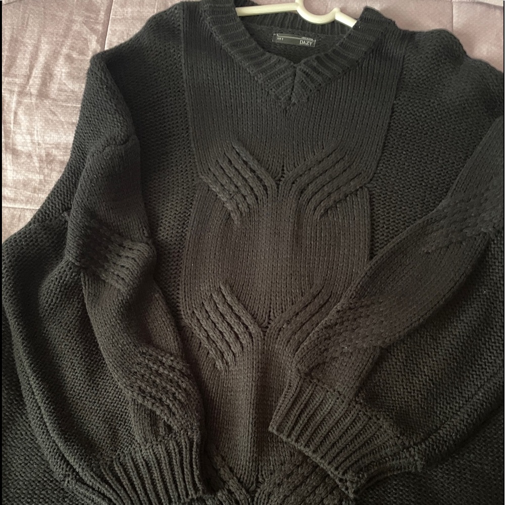 Sweater tejido negro de mangas largas